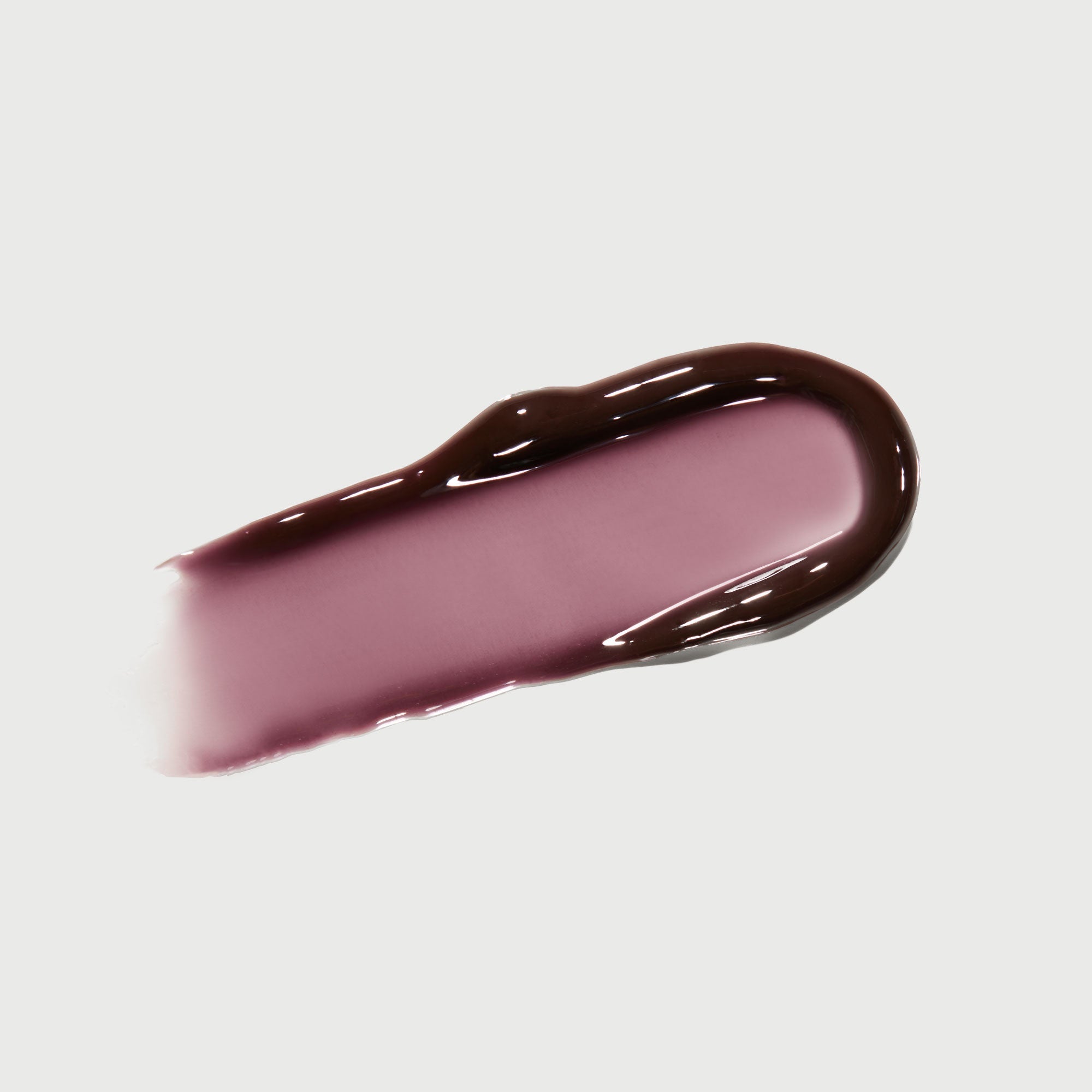 phyto-glow-lip-balm-midnight-z5 NATR-10118-Swatch-Phyto-Glow-Midnight-bonebkgd.jpg