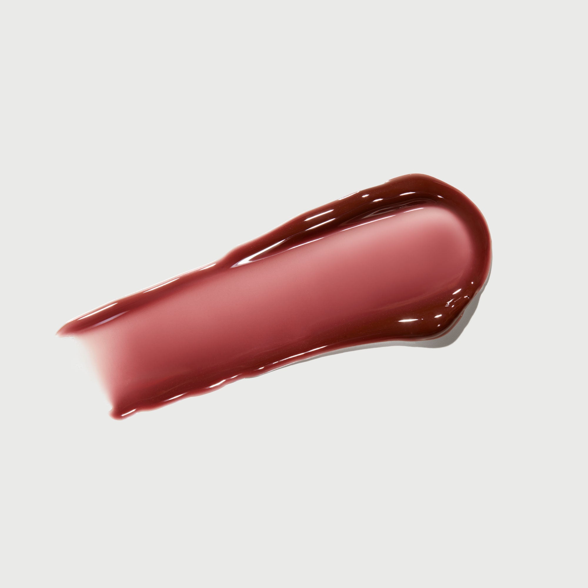 phyto-glow-lip-balm-crimson-p4 NATR-10122-Swatch-Phyto-Glow-Crimson-bonebkgd.jpg