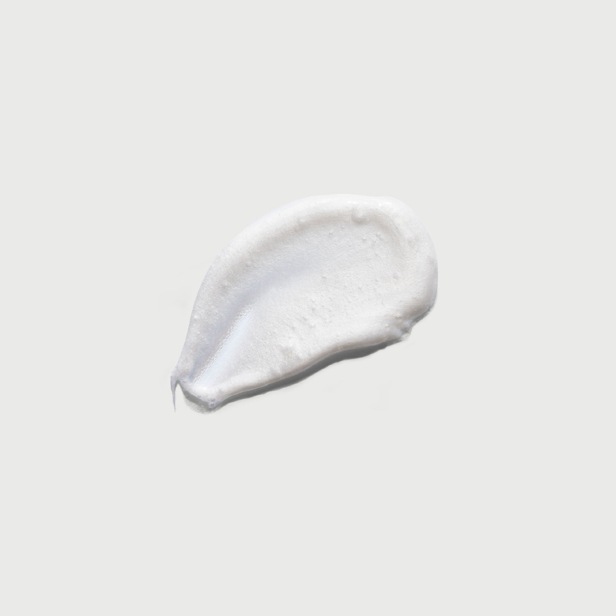 the-smoother-glycolic-acid-exfoliating-body-wash-l4 NATR-40002-Swatch-The-Smoother-Glycolic-Acid-Exfoliating-Body-Wash-bonebkgd.jpg