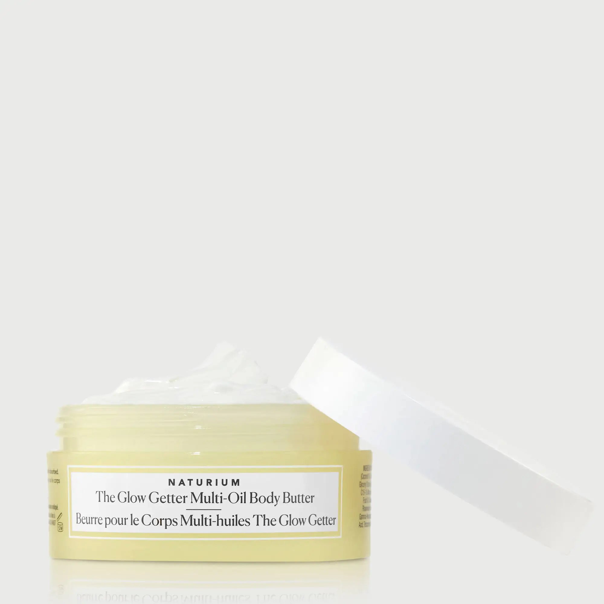 the-glow-getter-multi-oil-body-butter-travel-size-b9 NATR-40115_Glow-Getter-Body-Butter-Mini_front_capoff_bonebkgd.webp