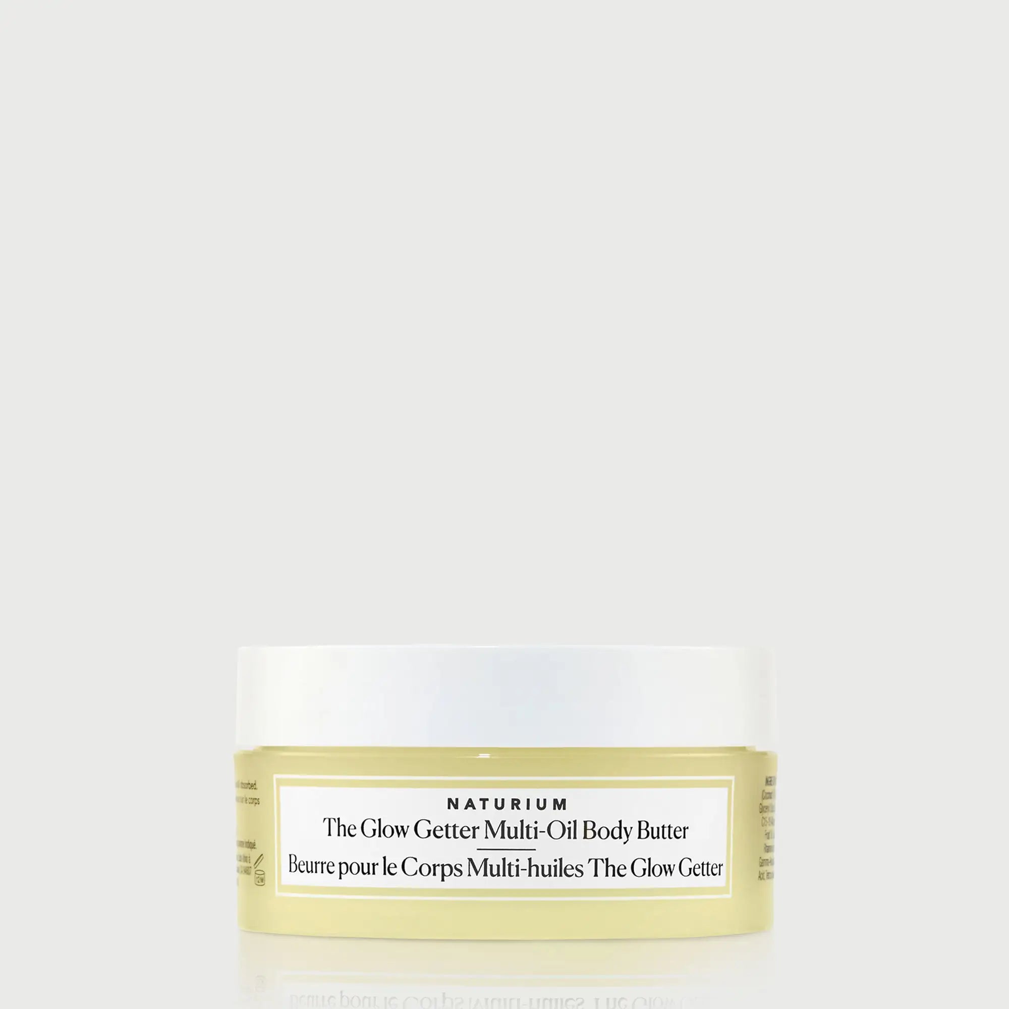 the-glow-getter-multi-oil-body-butter-travel-size-b9 NATR-40115_Glow-Getter-Body-Butter-Mini_front_capon_bonebkgd.webp